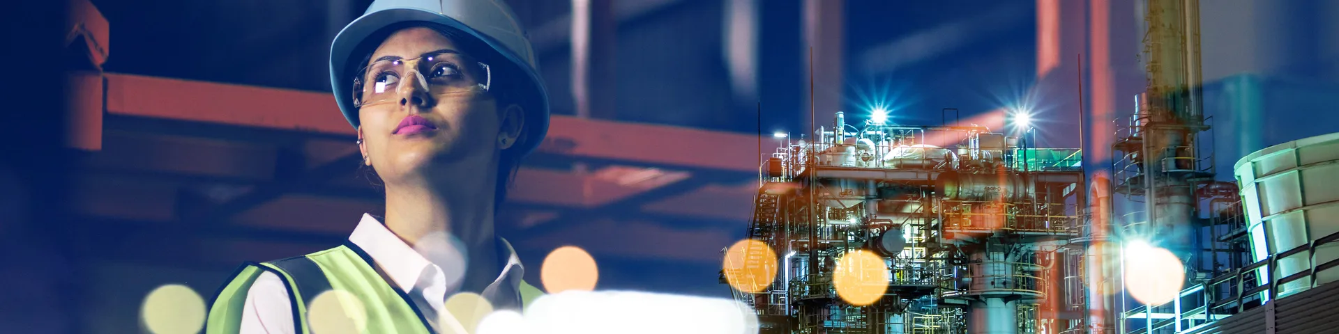 Engineer woman working late night with plant on background