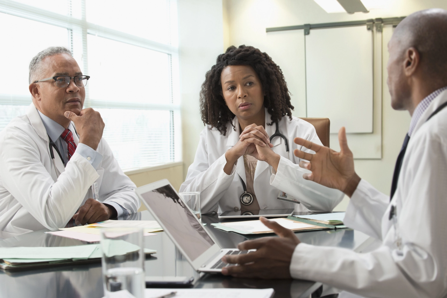 Four dimensions of trust in clinical AI