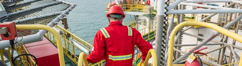 Young oil worker on offshore oil rig